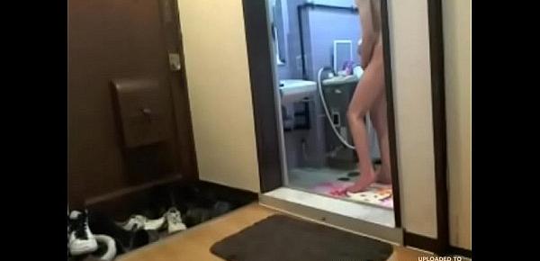  Short-haired Asian whore is masturbating after the shower